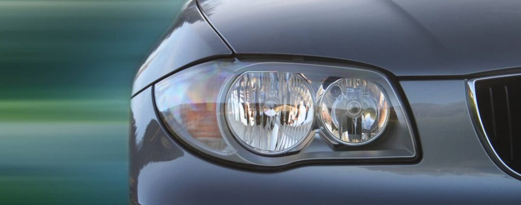 Close-up shot of the front of a BMW car.